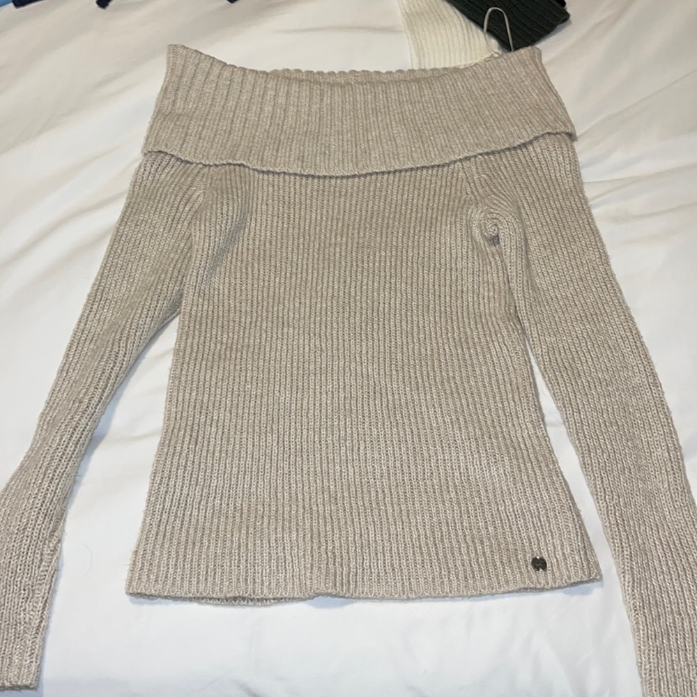Cream off the shocker sweater